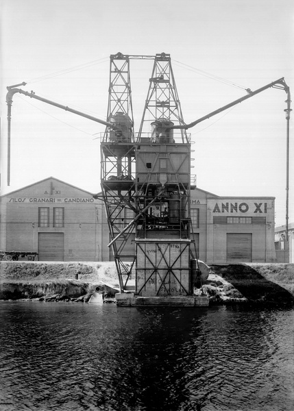 Detail of a warehouse of the Silos Granari del Candiano company overlooking the canal, left bank